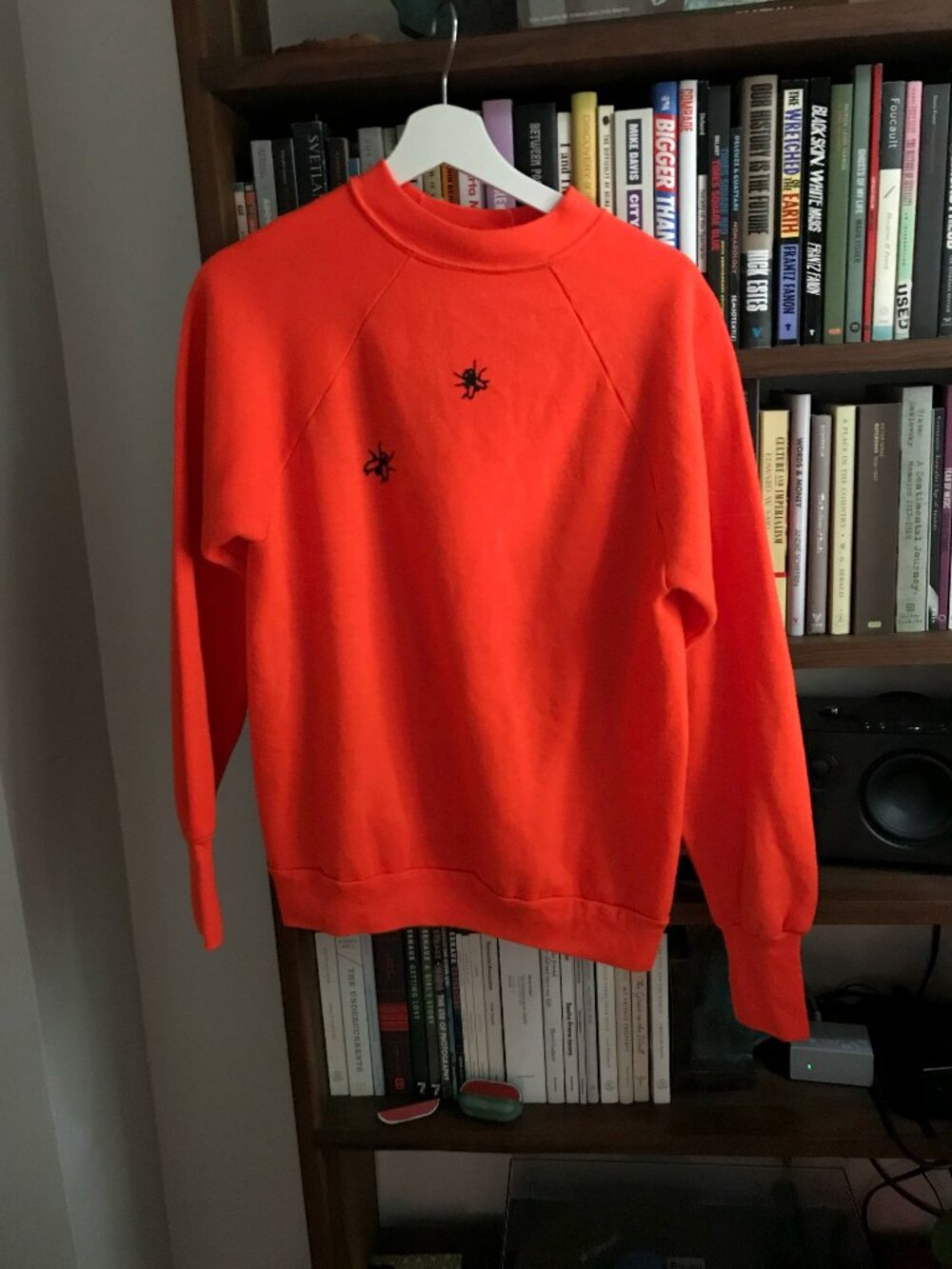 Bright orange sweatshirt with painted flies, Size M